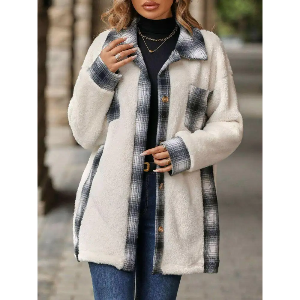 Elevate your wardrobe with the plaid contrast dropped shoulder coat $35 pocketed, a design element that brings both