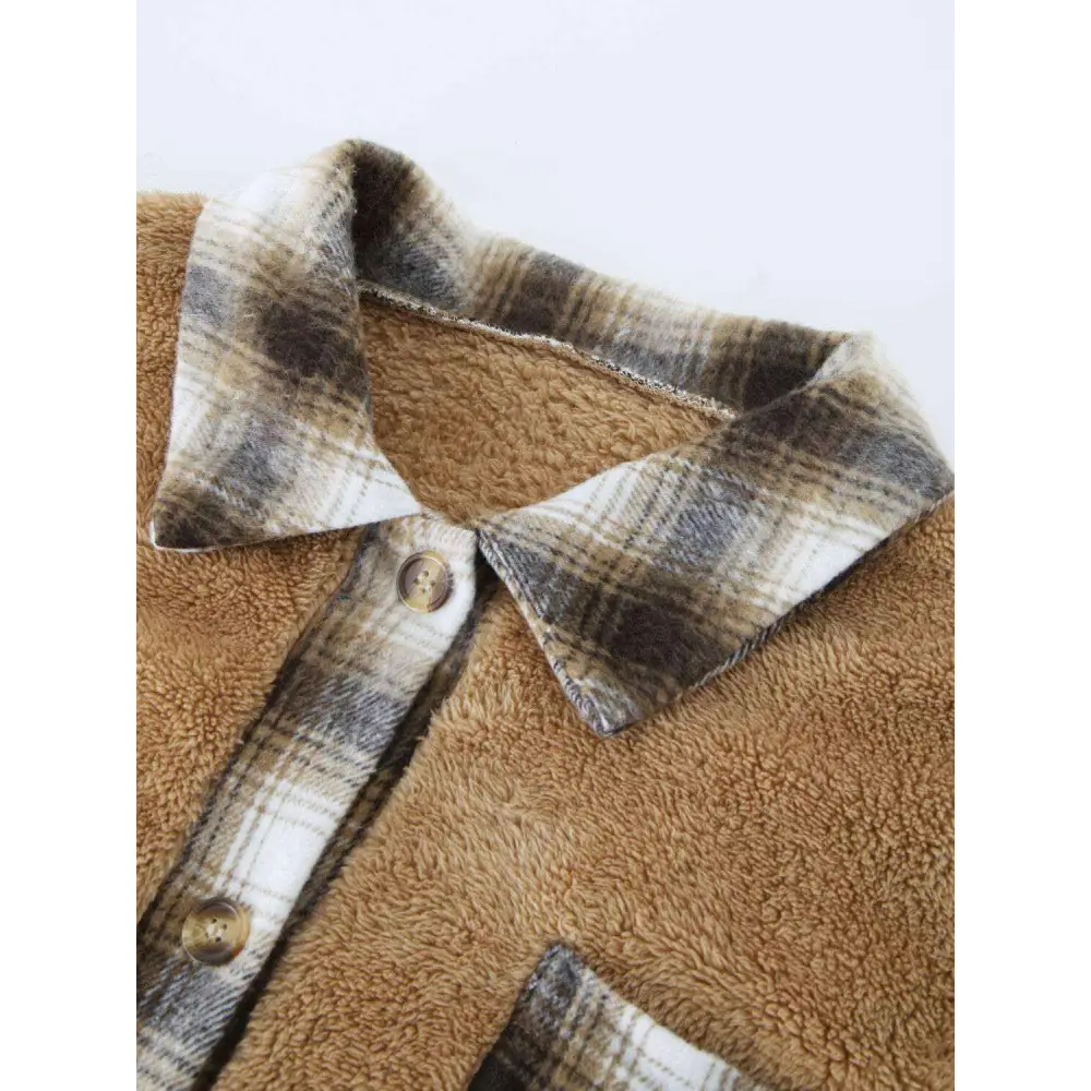 Elevate your wardrobe with the plaid contrast dropped shoulder coat $35 pocketed, a design element that brings both