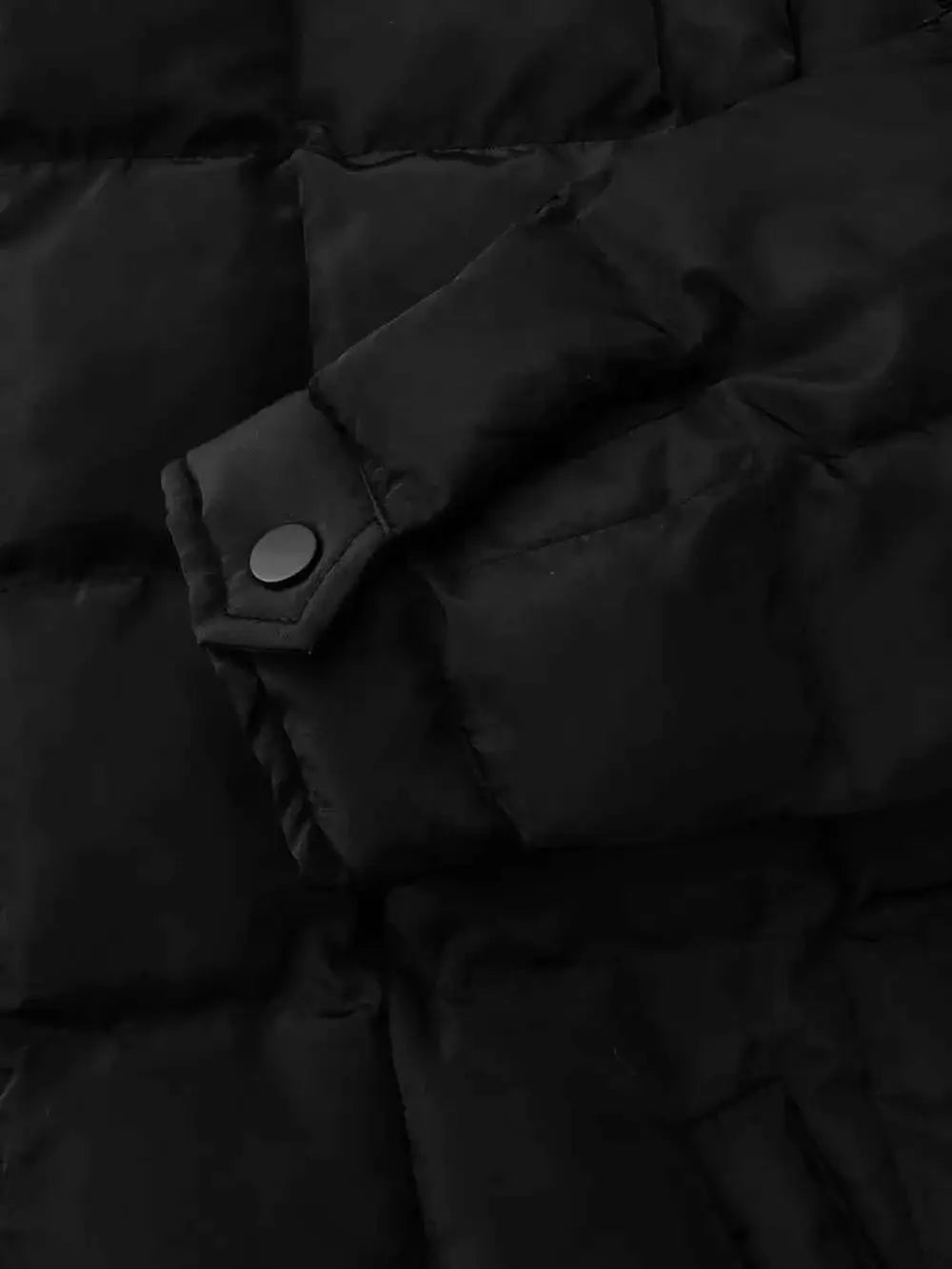 Pocketed Plaid Quilted black polyester winter coat sleeve and snap cuff detail with quilted pattern