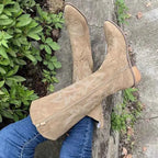 Knee-high tan suede Point Toe Block Heels boots with decorative stitching and mid-height wooden block heels.