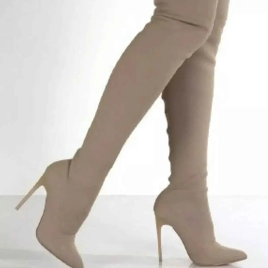 Point Toe Stiletto Boots in beige stretch fabric with pointed toes and high stiletto heels, knee-high design.