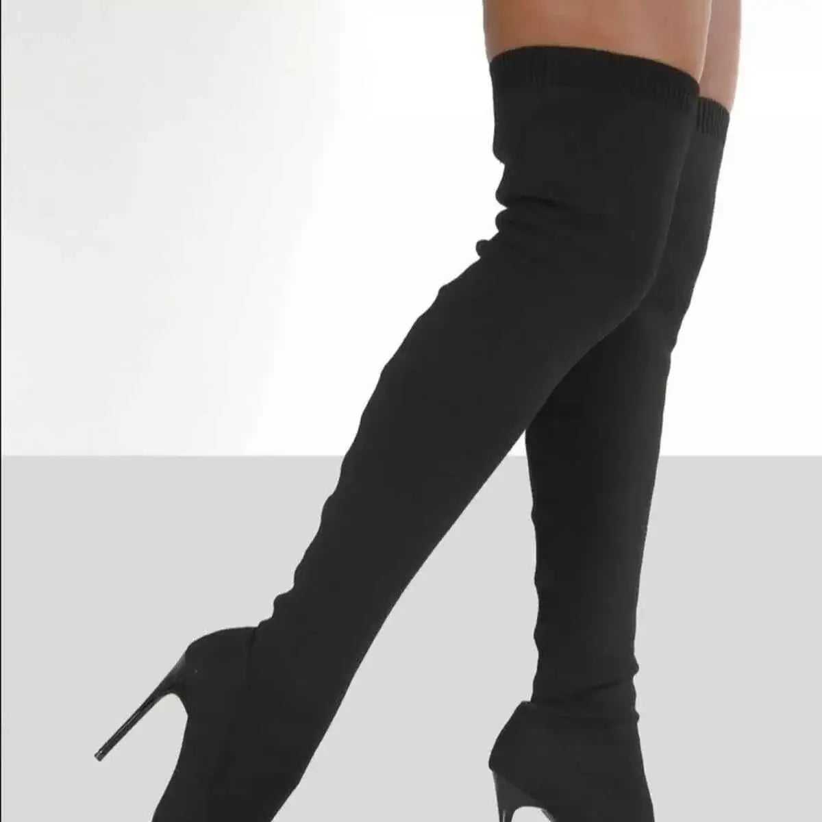 Black high-heeled Point Toe Stiletto Boots with a sleek, over-the-knee design and a slim stiletto heel.