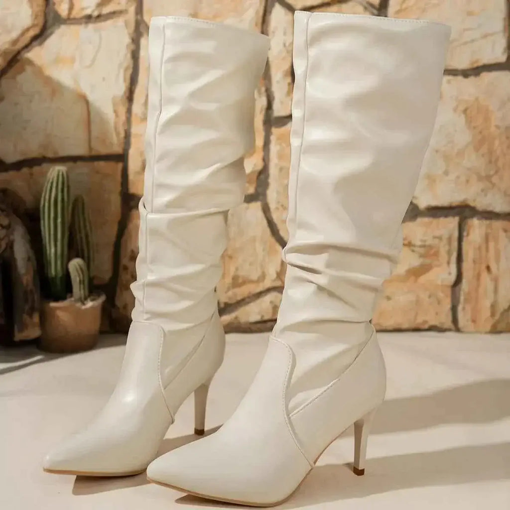 White PU leather Point Toe Stiletto Boots with high heels and slouchy shaft design