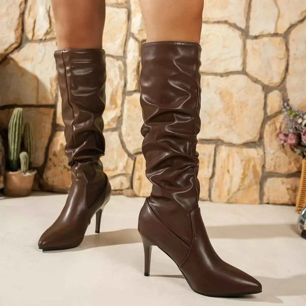 Point Toe Stiletto Boots in dark brown PU leather with a ruched shaft and high stiletto heels for a sleek look