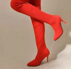 Point Toe Stiletto Boots in bright red stretch mesh fabric with high stiletto heels and pointed toes.