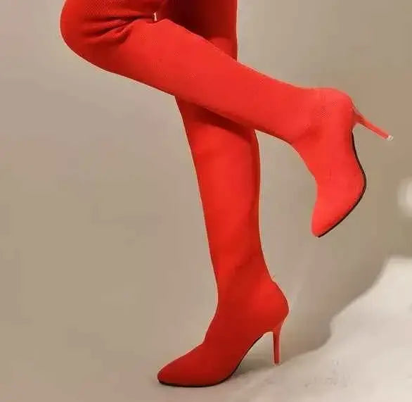 Point Toe Stiletto Boots in bright red stretch mesh fabric with high stiletto heels and pointed toes.