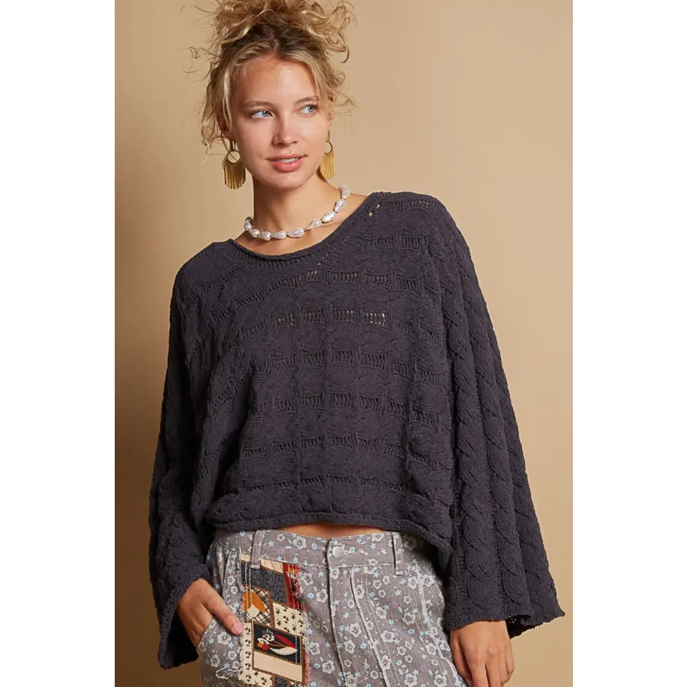 Elevate your style with the pol round neck cable knit cropped sweater $59.99 this exquisite semi-cropped top