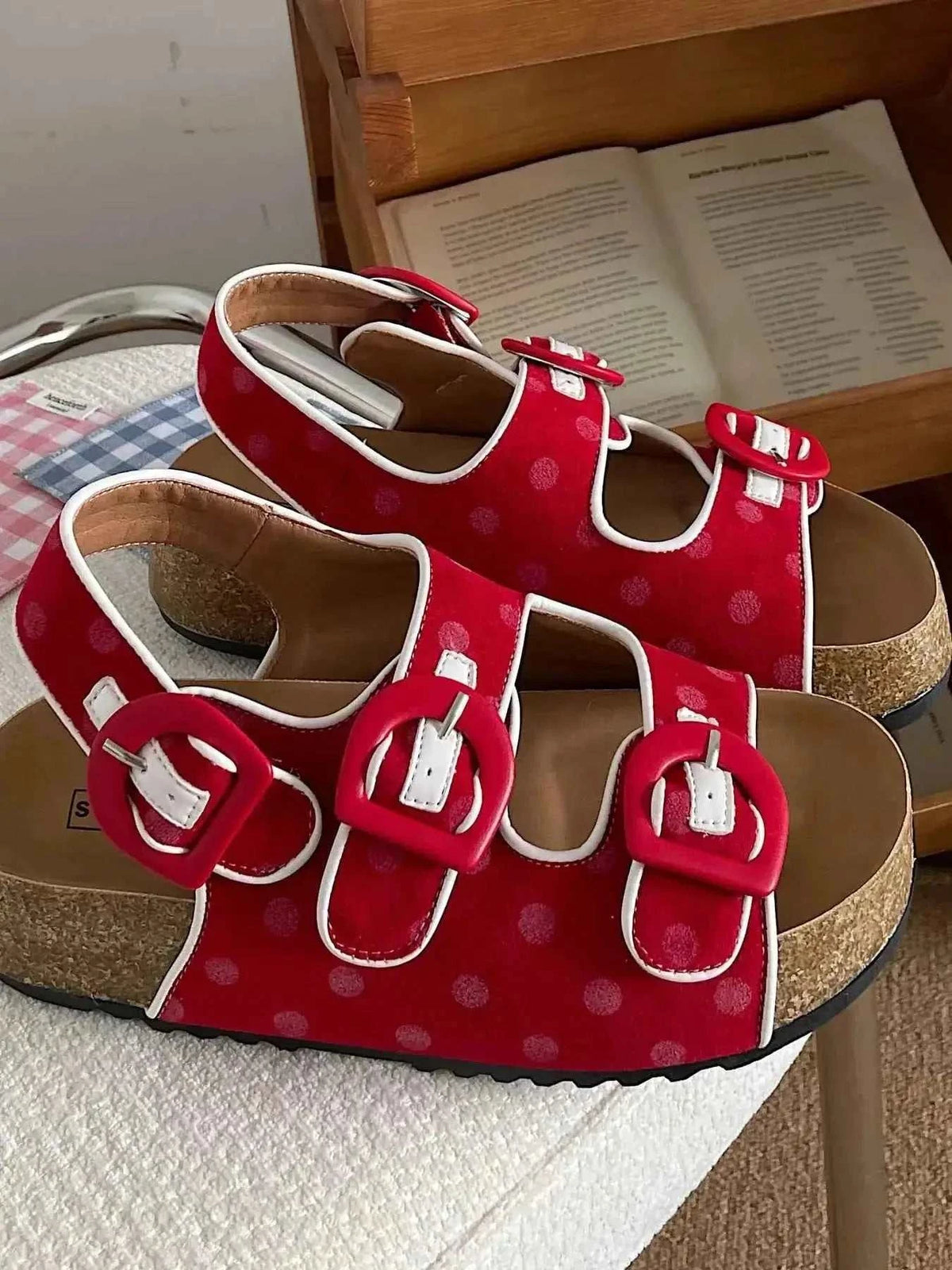 Polka Dot Double Buckle red platform sandals with white polka dots, large red buckles, and cork sole flats