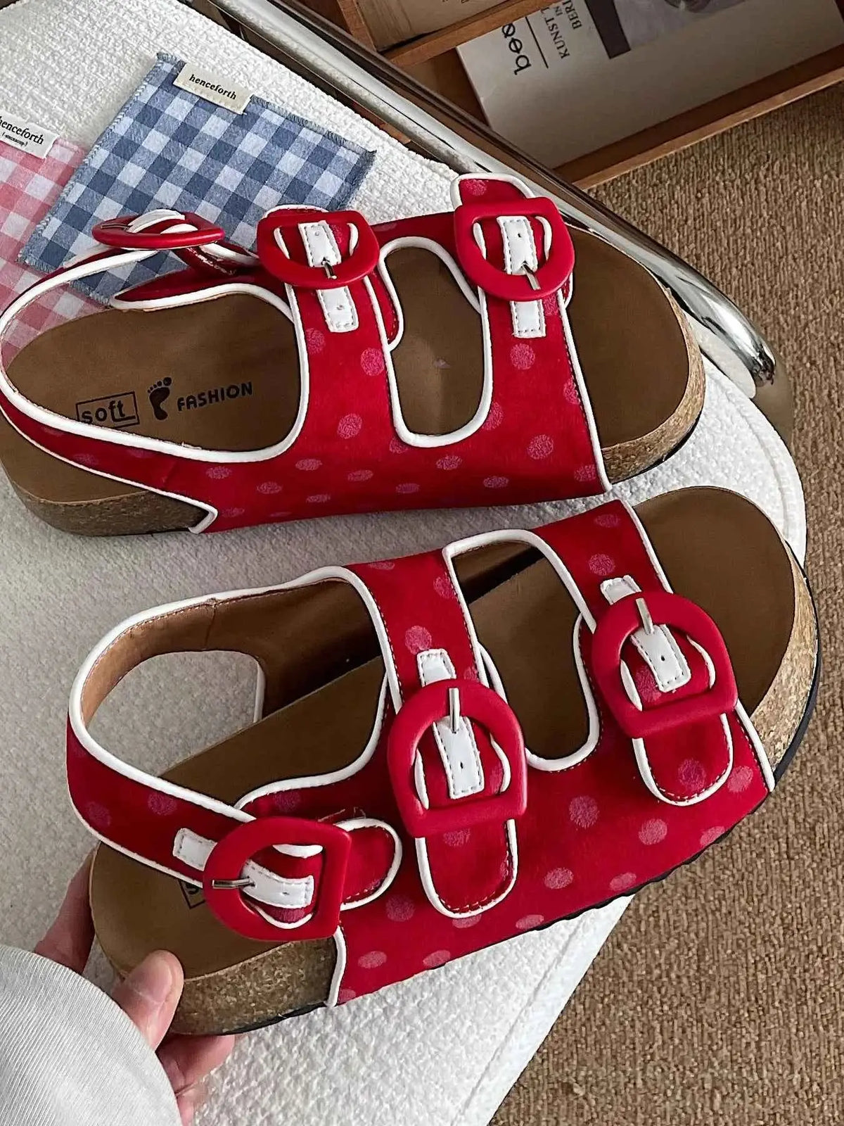 Polka Dot Double Buckle red platform sandals with white trim and circular buckles on soft brown insoles