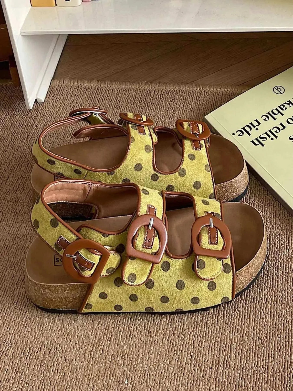 Polka Dot Double Buckle platform sandals with yellow suede, brown polka dots, and double buckle straps on cork soles