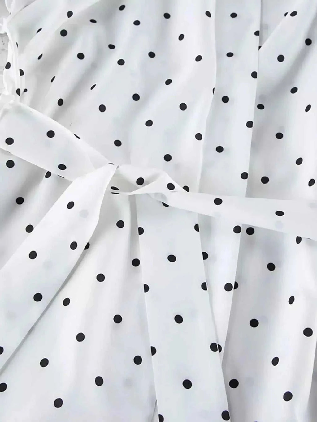 white fabric with black polka dots and tied waist detail featuring Polka Dot Lace Trim pattern