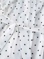 white fabric with black polka dots and tied waist detail featuring Polka Dot Lace Trim pattern