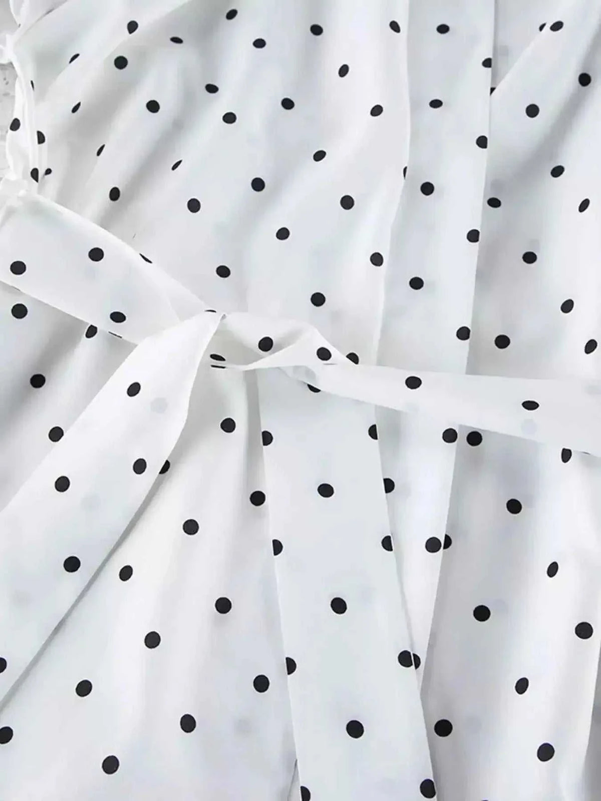 white fabric with black polka dots and tied waist detail featuring Polka Dot Lace Trim pattern