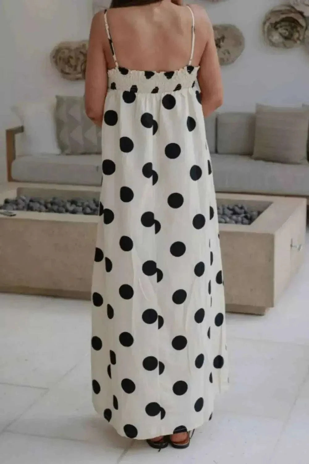 Polka Dot Spaghetti Straps Maxi Dress with black polka dots on white fabric, featuring a smocked back and thin shoulder straps