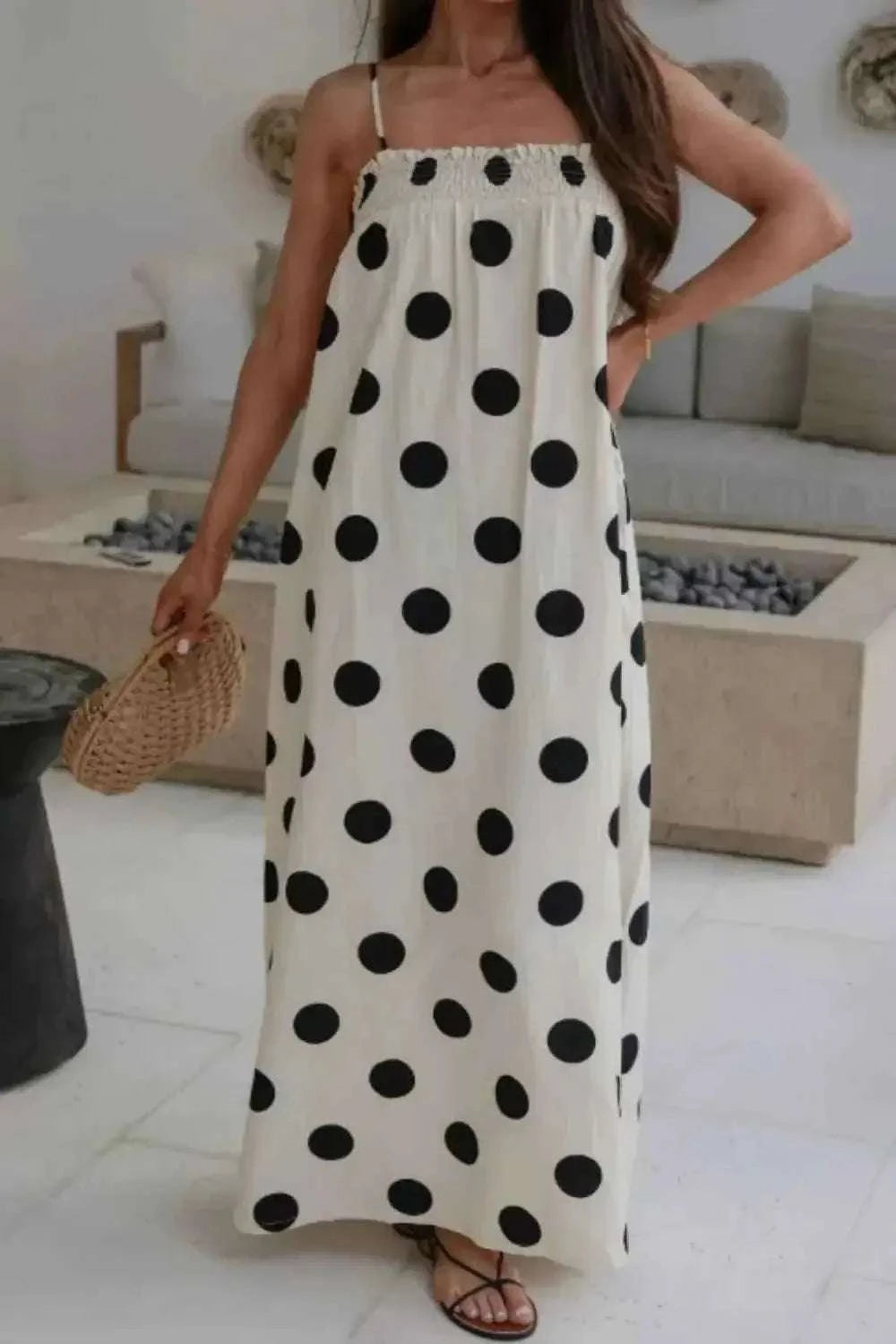 Polka Dot Spaghetti Straps Maxi Dress in white polyester with large black polka dots, smocked bodice, and pockets