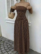 Polka Dot Strapless Maxi Dress in brown with white polka dots, fitted bodice, and flowing skirt