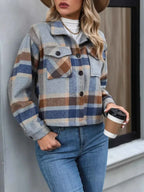 Polka Noir plaid button-up jacket in muted blue, tan, and gray hues with chest pockets and button details