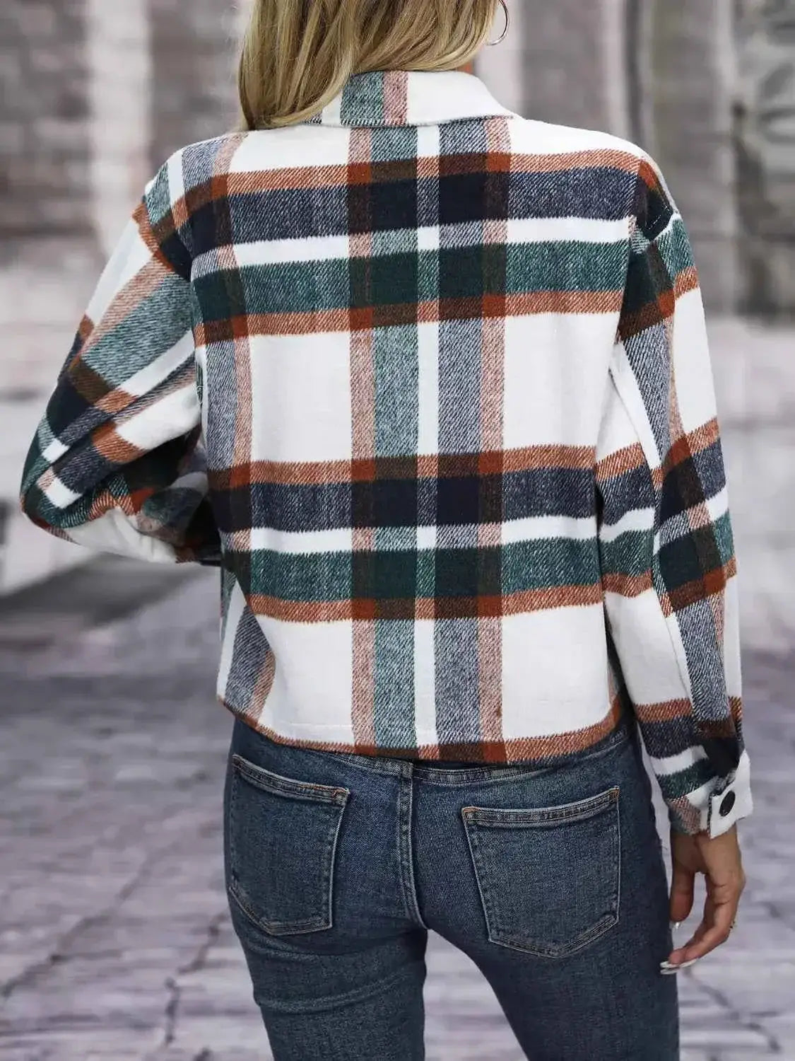 Polka Noir plaid button-up jacket in white, green, orange, and black with a classic check pattern and long sleeves