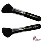 Pretty Perfect Set featuring two angled makeup brushes with black handles and soft black bristles for smooth application