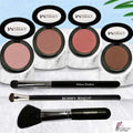Pretty Perfect Set featuring four pressed powders in neutral pink, bronze, and peach tones with three black makeup brushes on marble trays
