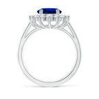 Princess Diana inspired 14K white gold ring featuring a deep blue oval lab-grown sapphire center with a round diamond halo setting