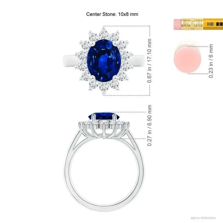 Princess Diana inspired 14K white gold ring with a deep blue oval lab-grown sapphire center stone surrounded by a sparkling diamond halo