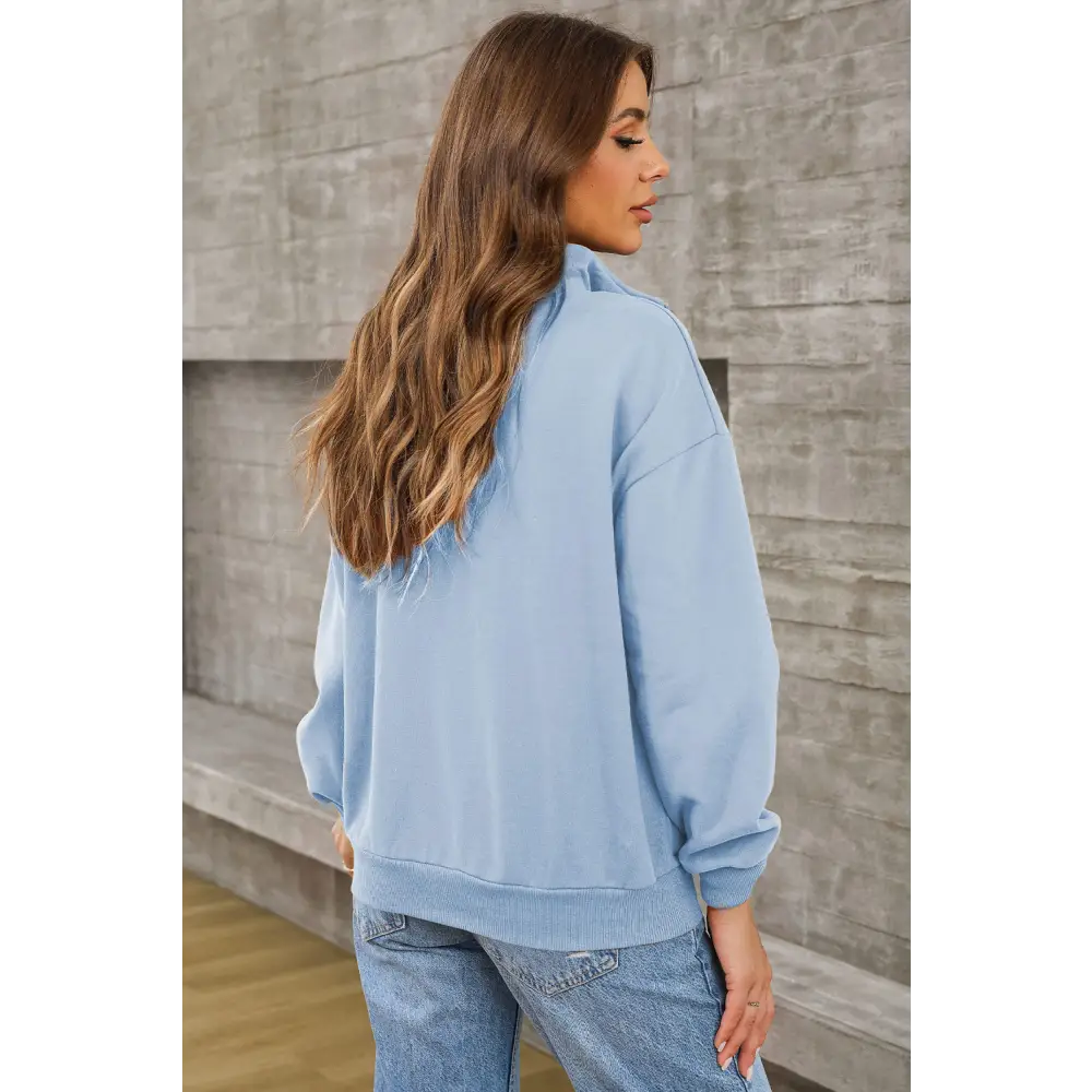 Elevate your wardrobe with the quarter zip dropped shoulder sweatshirt $45.99 pocketed, designed for the modern woman