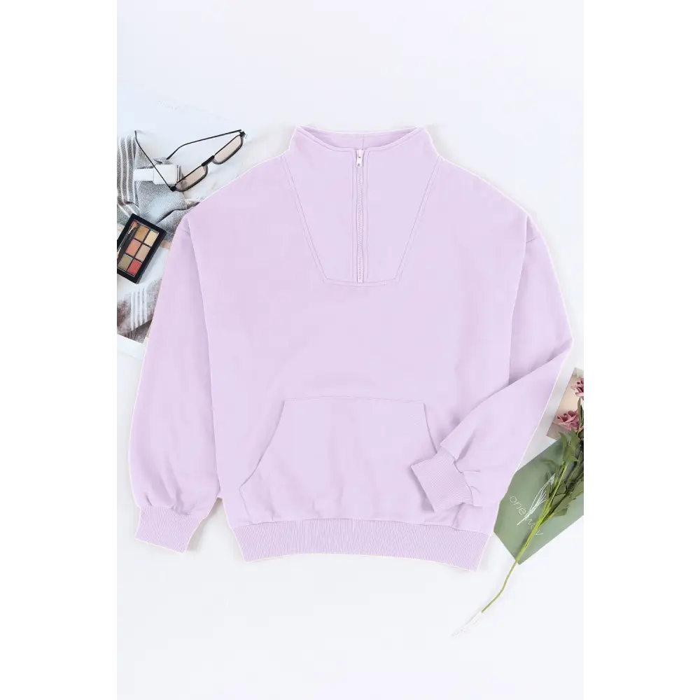 Elevate your wardrobe with the quarter zip dropped shoulder sweatshirt $45.99 pocketed, designed for the modern woman