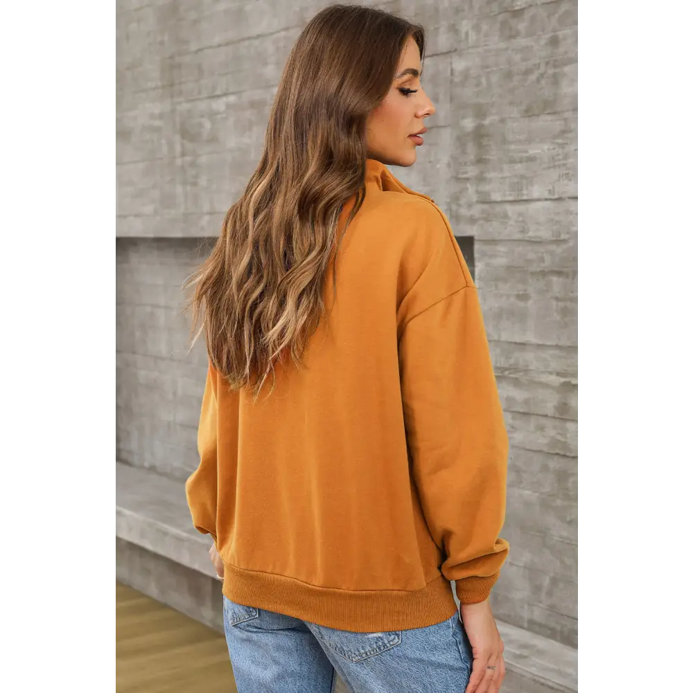 Elevate your wardrobe with the quarter zip dropped shoulder sweatshirt $45.99 pocketed, designed for the modern woman