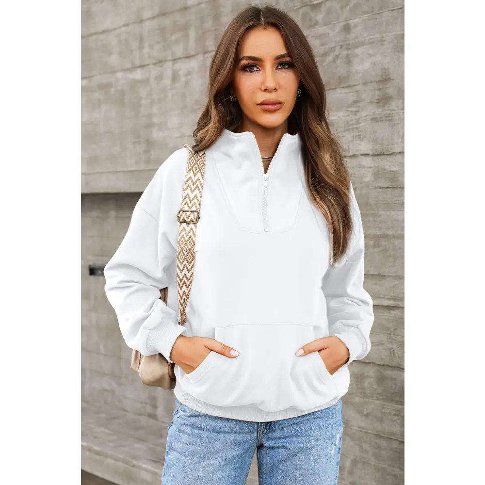 Elevate your wardrobe with the quarter zip dropped shoulder sweatshirt $45.99 pocketed, designed for the modern woman