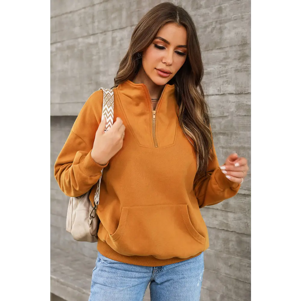 Elevate your wardrobe with the quarter zip dropped shoulder sweatshirt $45.99 pocketed, designed for the modern woman