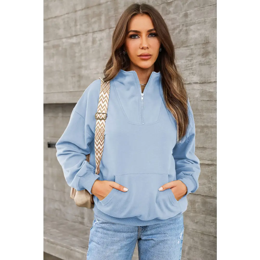 Elevate your wardrobe with the quarter zip dropped shoulder sweatshirt $45.99 pocketed, designed for the modern woman