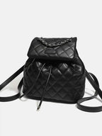 Mini black PU leather Quilted Chain Flap Backpack with diamond quilted pattern and silver chain detail on flap closure