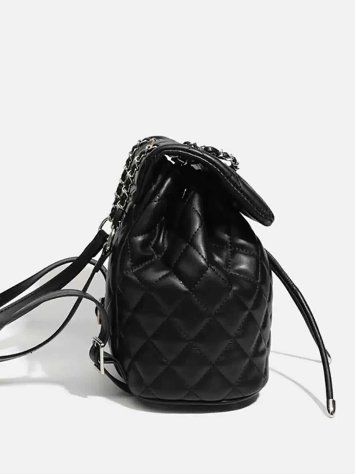 Quilted Chain Flap Backpack in black PU leather with diamond quilted pattern and silver chain strap detailing.