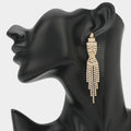 Rhinestone Tassel Drop Earrings in gold with sparkling clear rhinestones and cascading tassel design on black mannequin