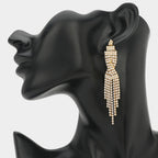 Rhinestone Tassel Drop Earrings in gold with sparkling clear rhinestones and cascading tassel design on black mannequin