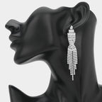 Rhinestone Tassel Drop Earrings featuring sparkling silver rhinestones with a cascading tassel design on a black mannequin ear