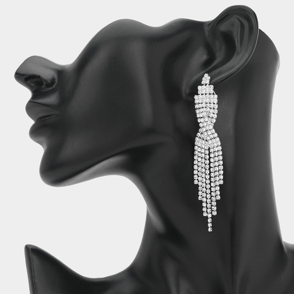 Rhinestone Tassel Drop Earrings featuring sparkling silver rhinestones with a cascading tassel design on a black mannequin ear
