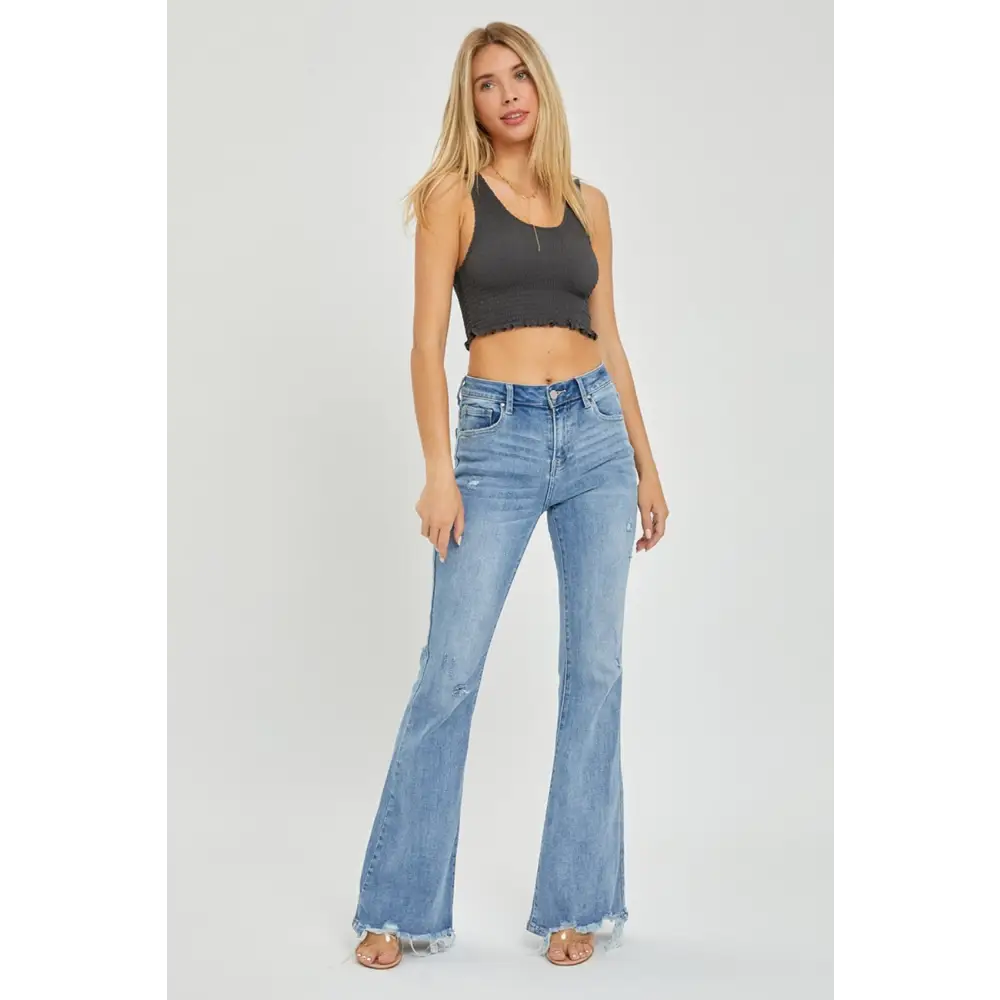 Risen high rise frayed hem flare jeans in luxury fashion for women $66.99 introducing the high rise frayed hem flare