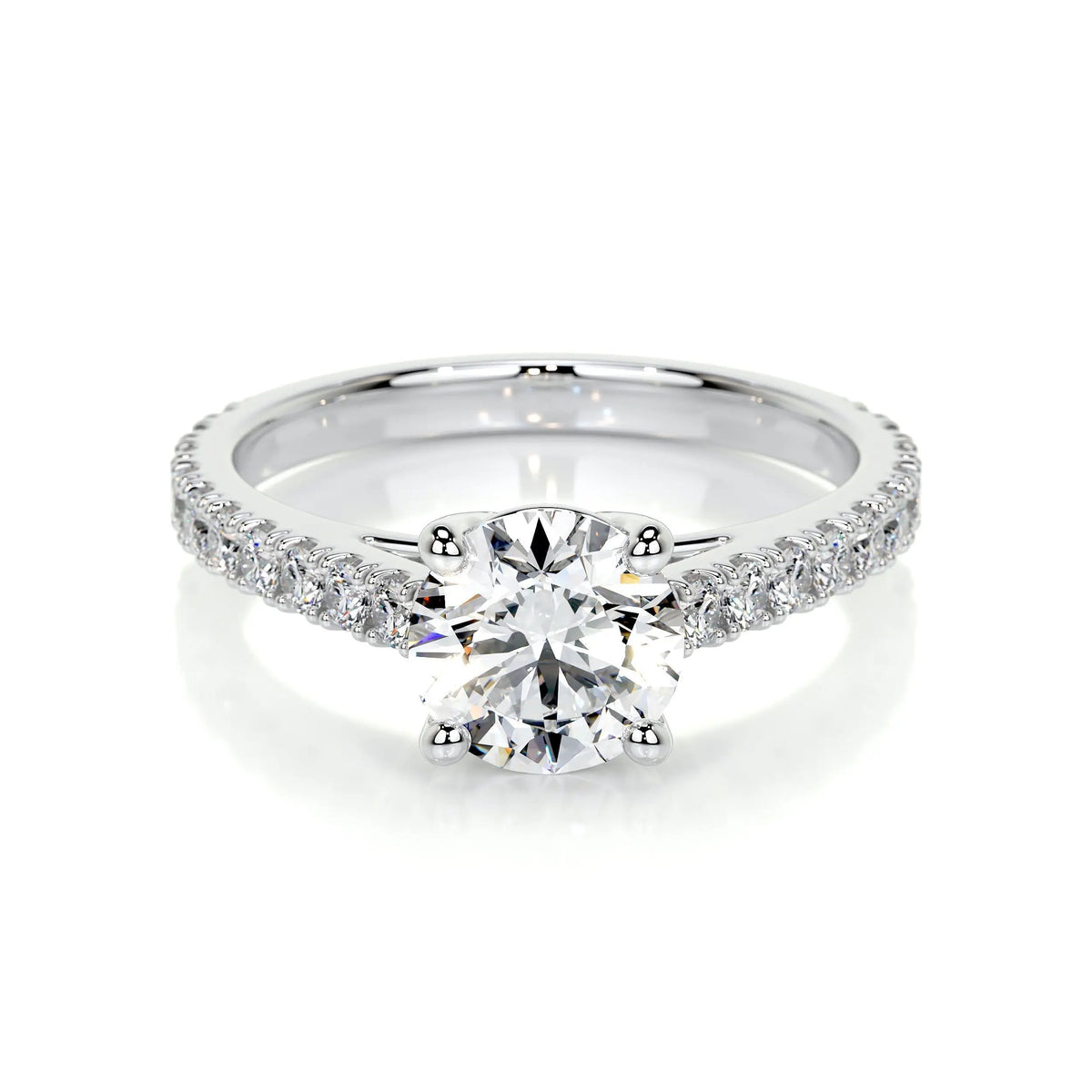 Round Brilliant Diamond engagement ring with 14K white gold band and channel-set side diamonds sparkling brightly