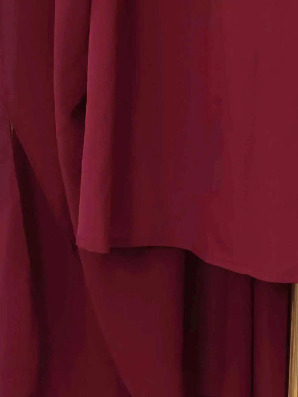 Ruched Halter Neck deep red polyester cape maxi dress with asymmetrical hem and slight stretch fabric