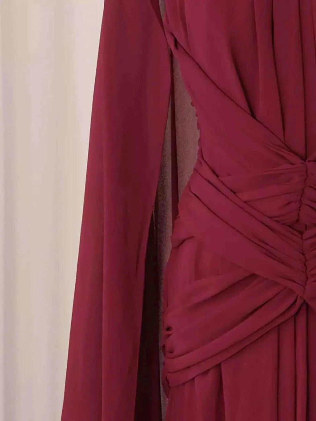 Ruched Halter Neck deep red polyester fabric with gathered detailing and flowing asymmetrical design