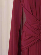 Ruched Halter Neck deep red polyester fabric with gathered detailing and flowing asymmetrical design