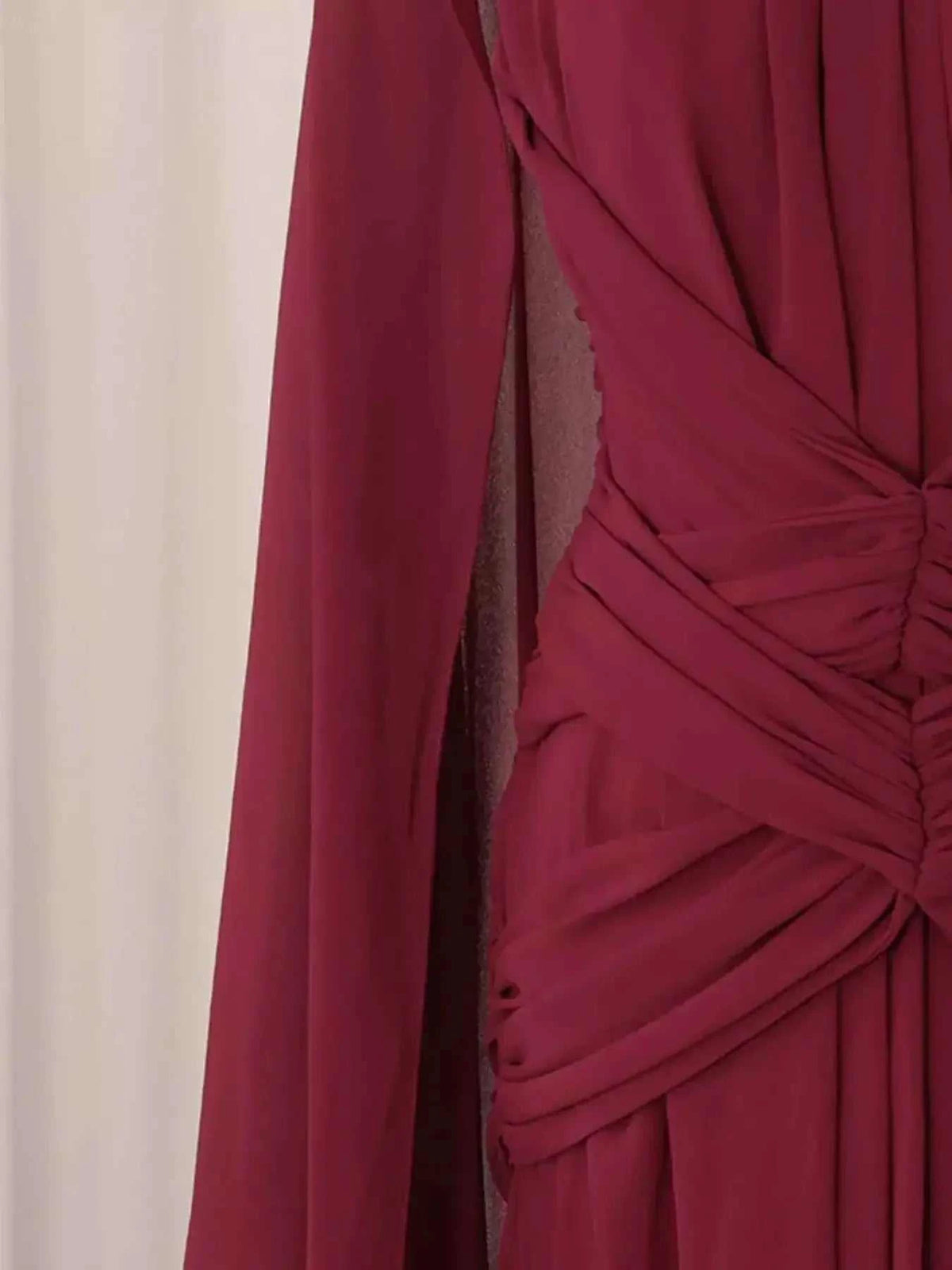 Ruched Halter Neck deep red polyester fabric with gathered detailing and flowing asymmetrical design