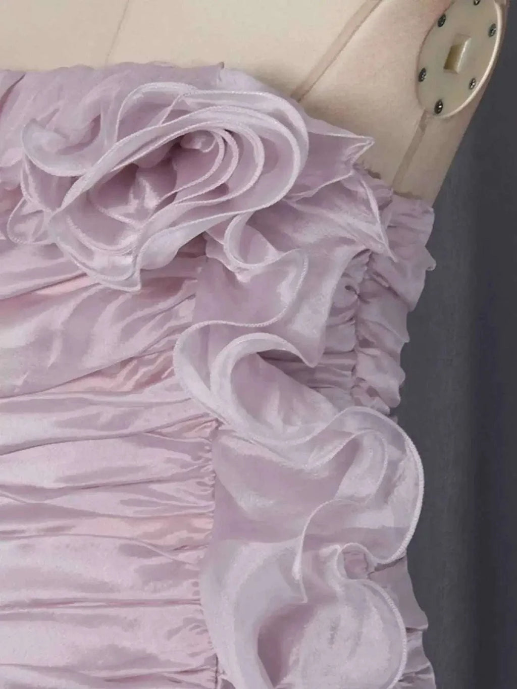 Ruffled High-Low Strapless Dress in pale lavender satin with cascading ruffles and a gathered waist detail