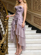 Ruffled High-Low Strapless Dress in soft lavender chiffon with cascading ruffles and a high-low hemline for elegant movement.