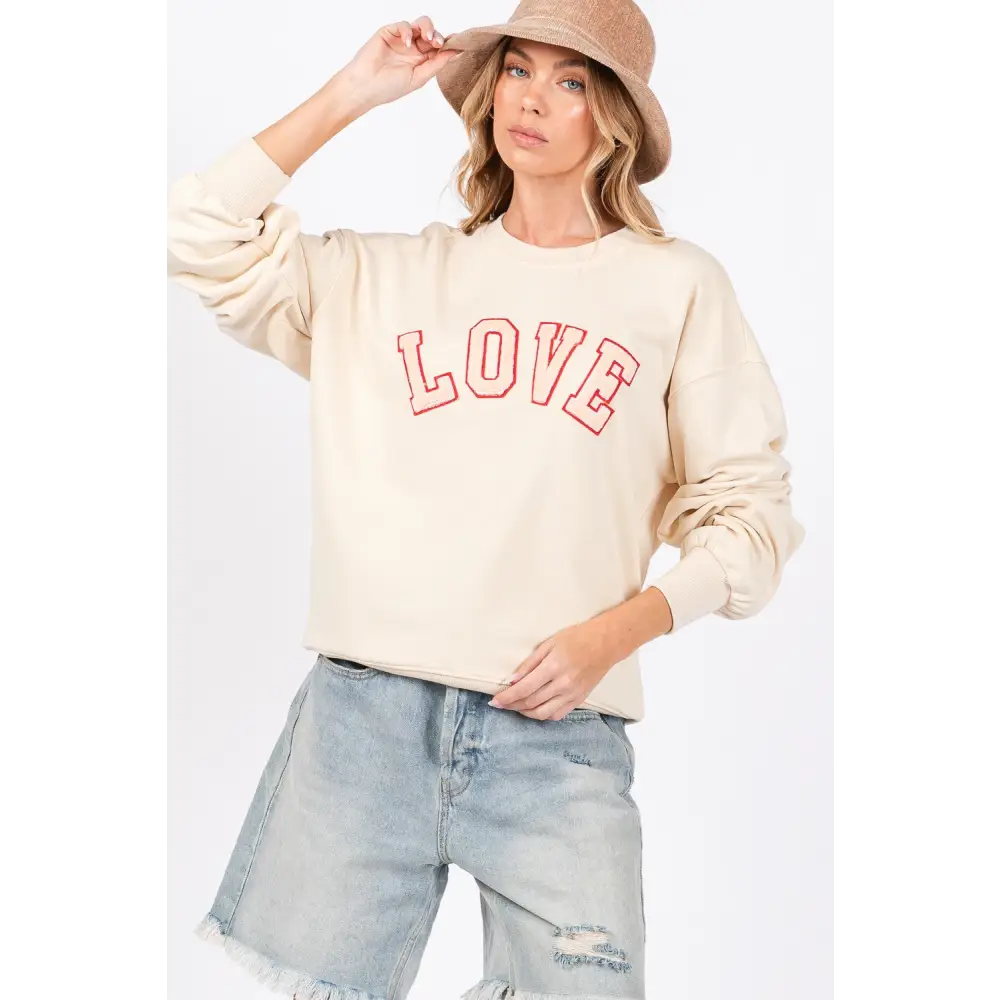 Sage + fig love path sweatshirt redefining luxury fashion for women $61.99 introducing the love path applique drop