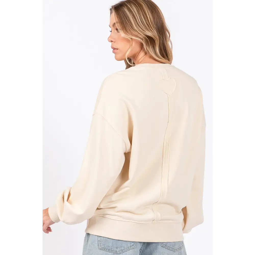 Sage + fig love path sweatshirt redefining luxury fashion for women $61.99 introducing the love path applique drop