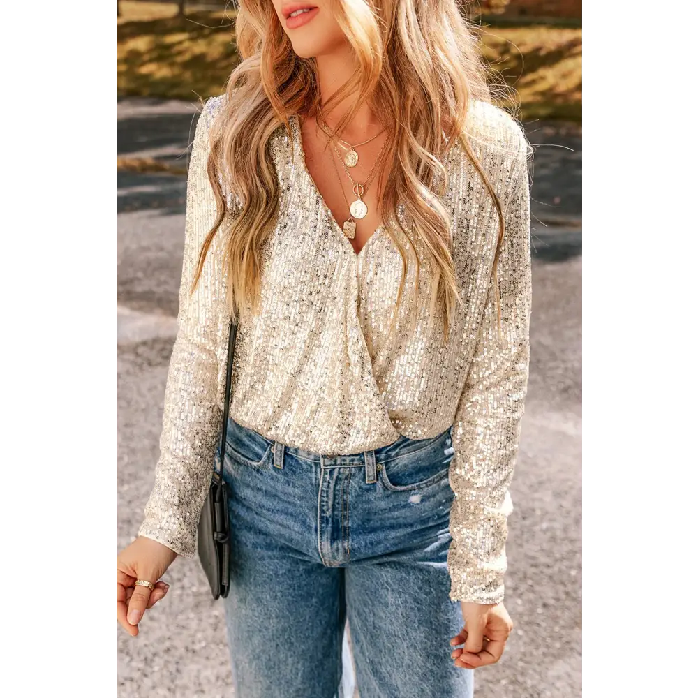 Dazzling sequin long sleeve bodysuit for luxury fashion enthusiasts $39.99 dazzling sequin embellishments that add