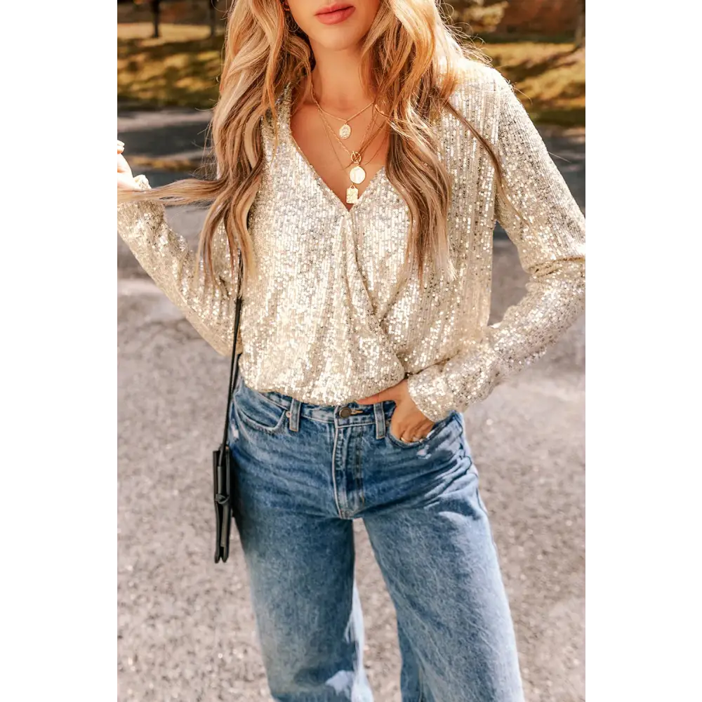 Dazzling sequin long sleeve bodysuit for luxury fashion enthusiasts $39.99 dazzling sequin embellishments that add